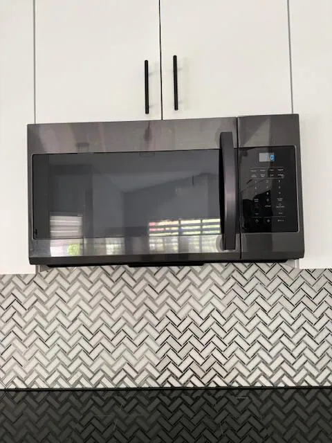 Microwave above the induction stove.