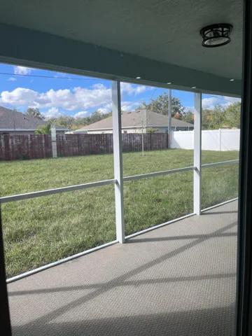 Screened patio off living room. Impact windows.