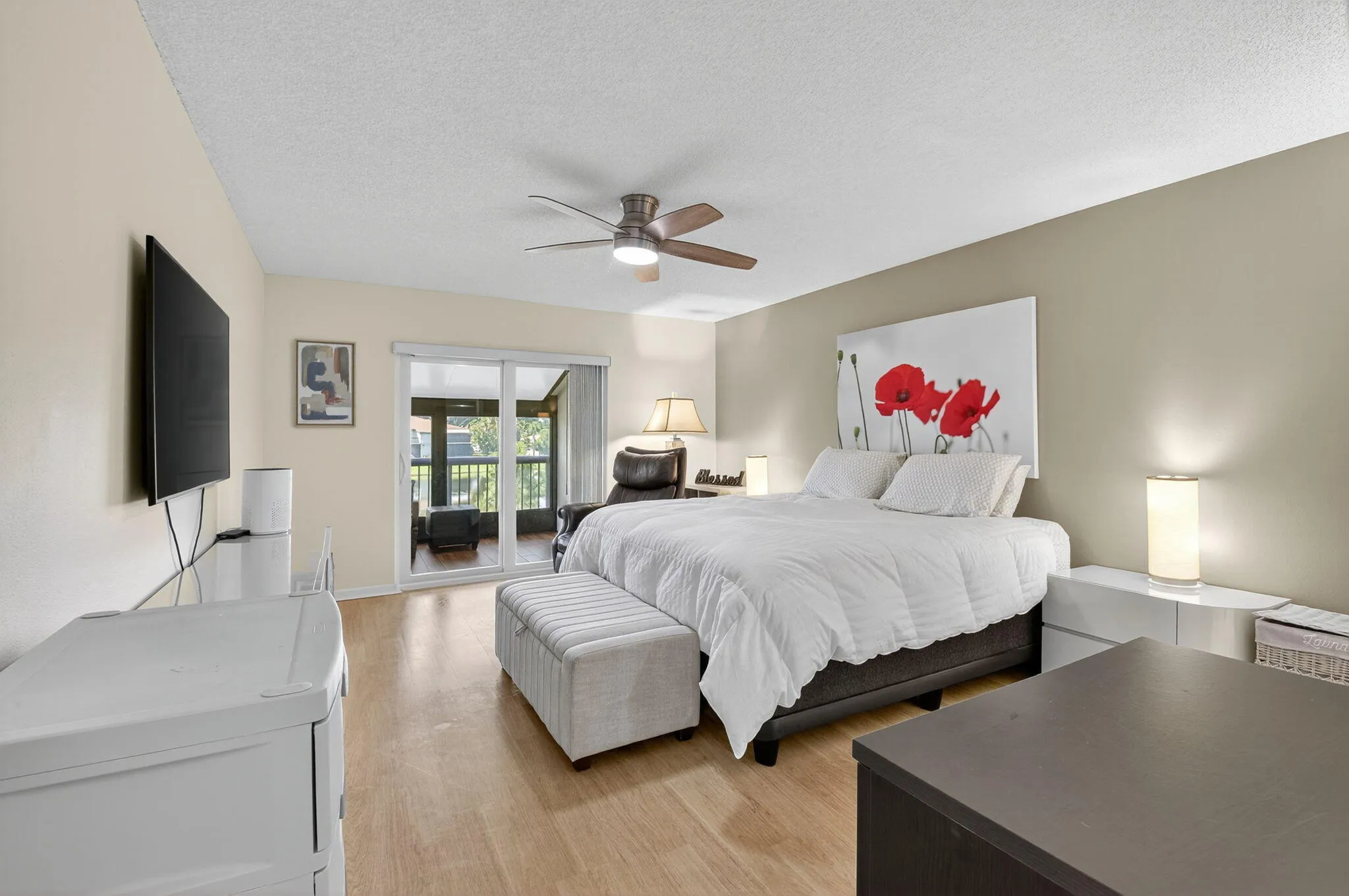 MASTER BEDROOM w/ ACCESS TO REAR BALCONY