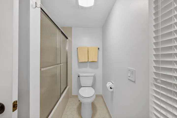GUEST BATHROOM WITH TUB SHOWER COMBO