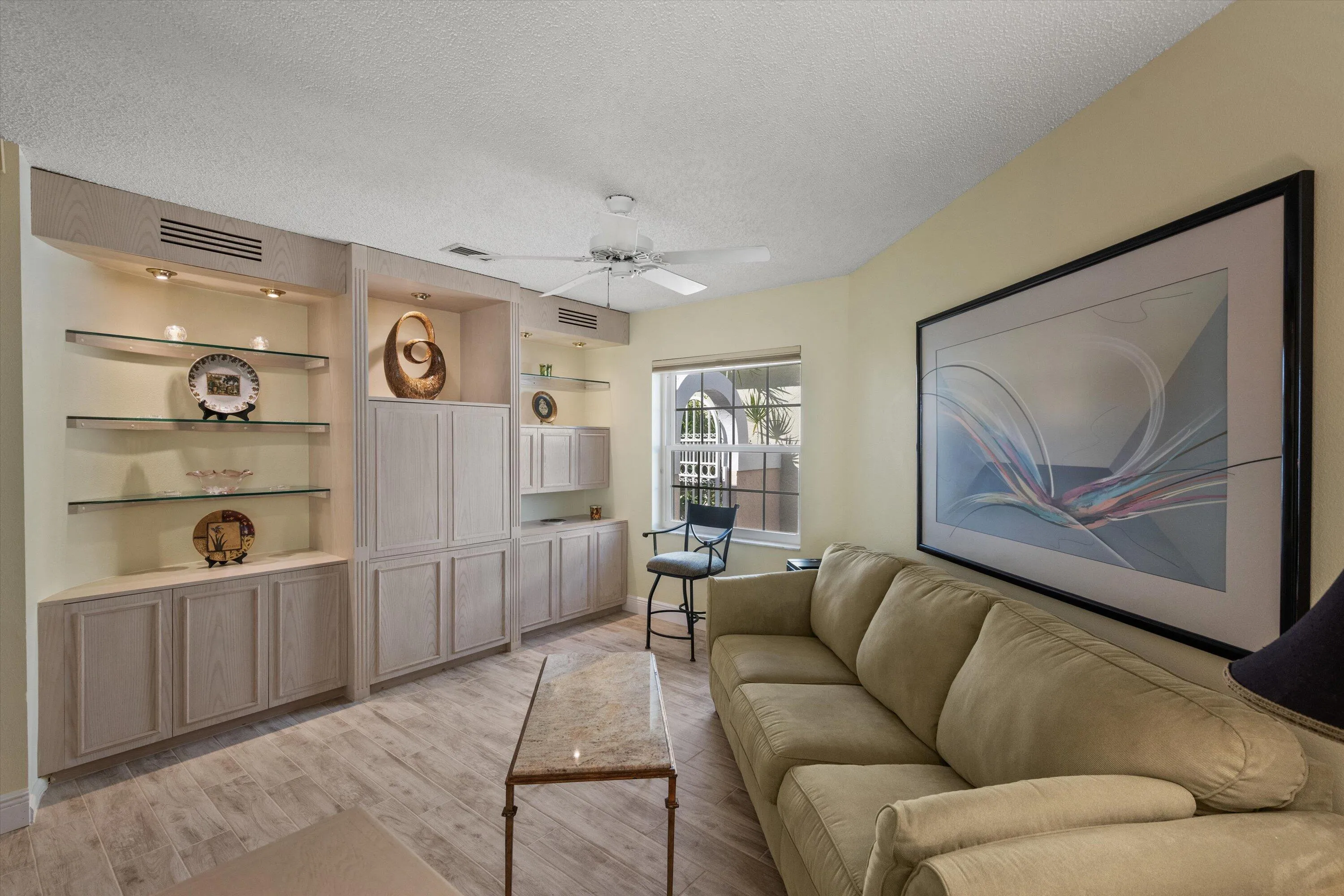 porcelain tile floors and built-in shelving