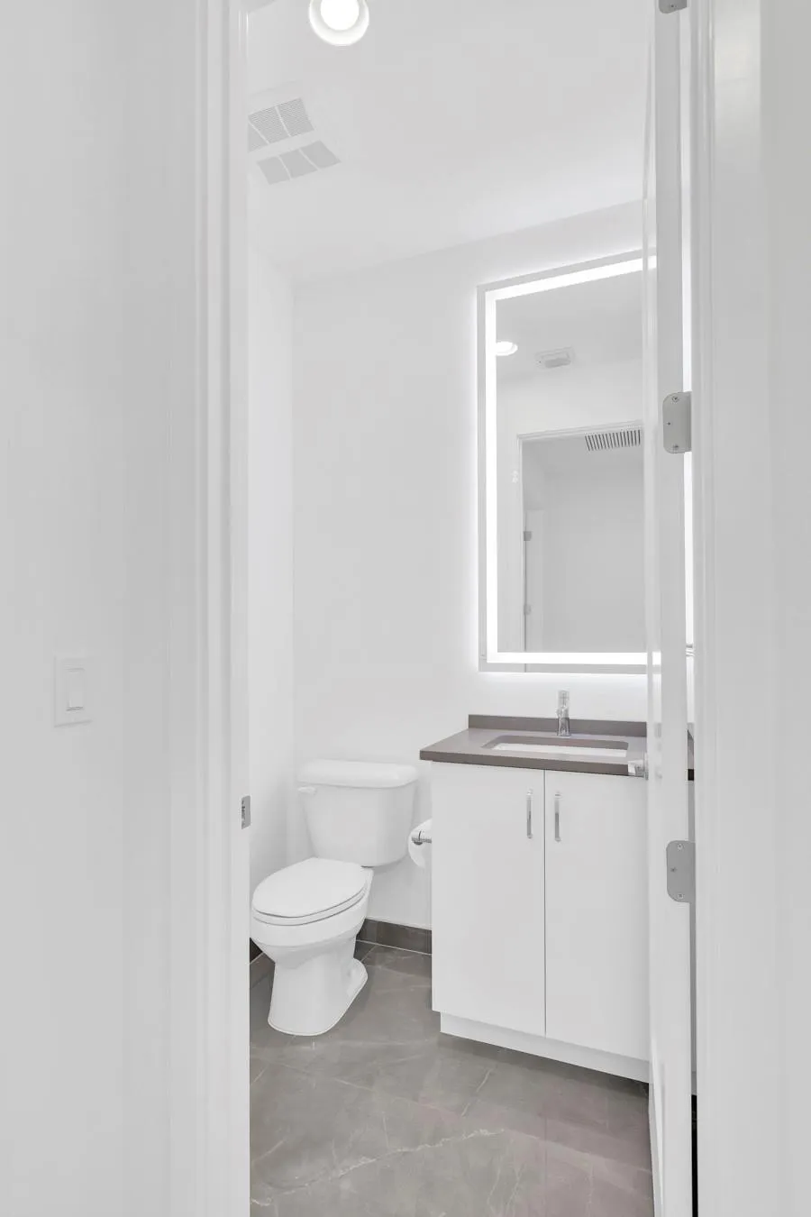 Powder Room 2nd Floor on the side of Movie Theater Room