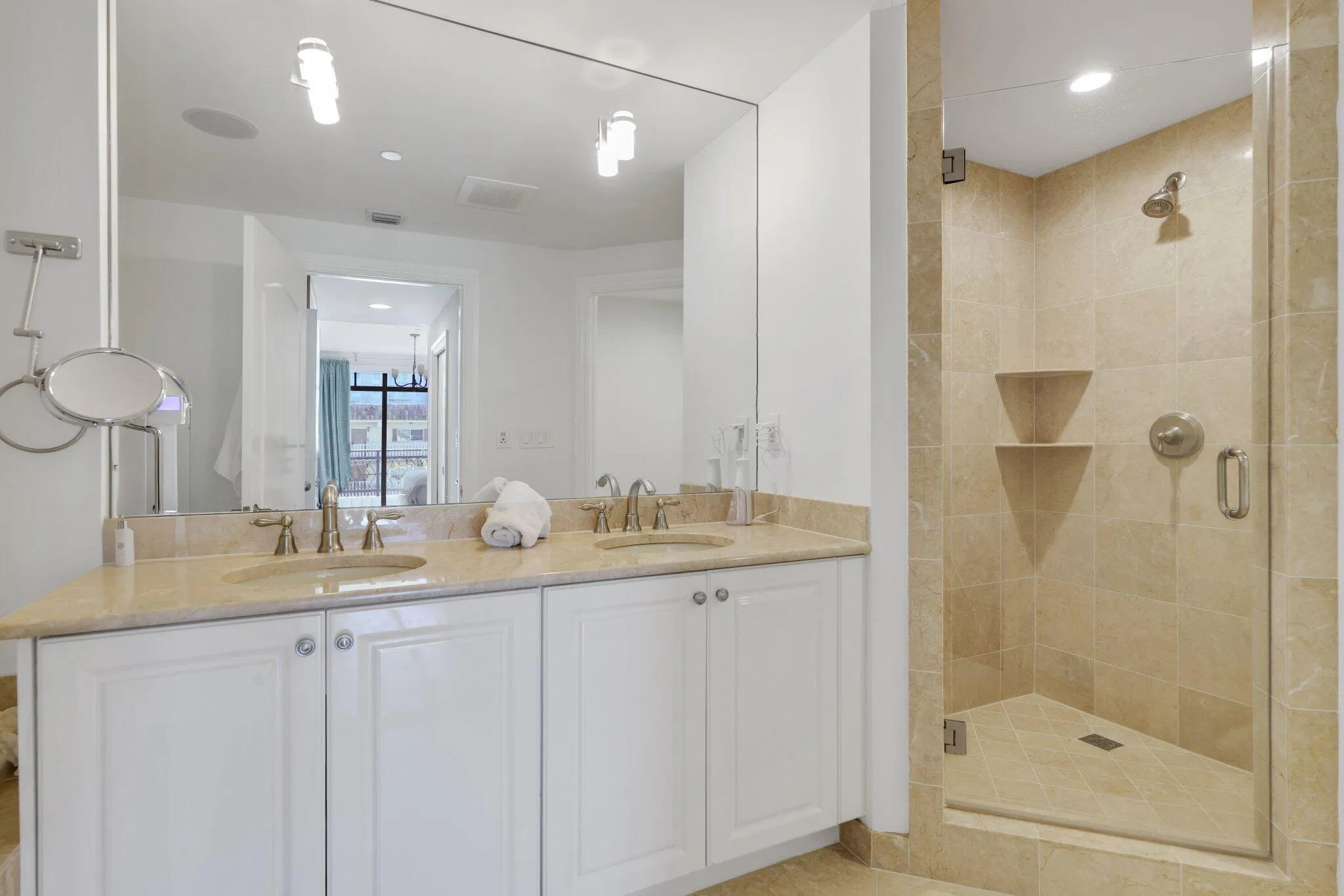 Glass Enclosed Shower & Double Vanity Sinks