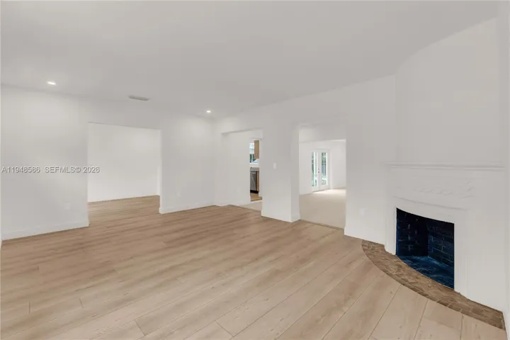 Living Room with Fireplace & Seamless Flow