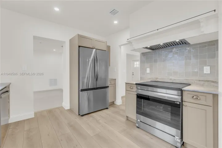 Kitchen with Flow to Dining & Family Rooms