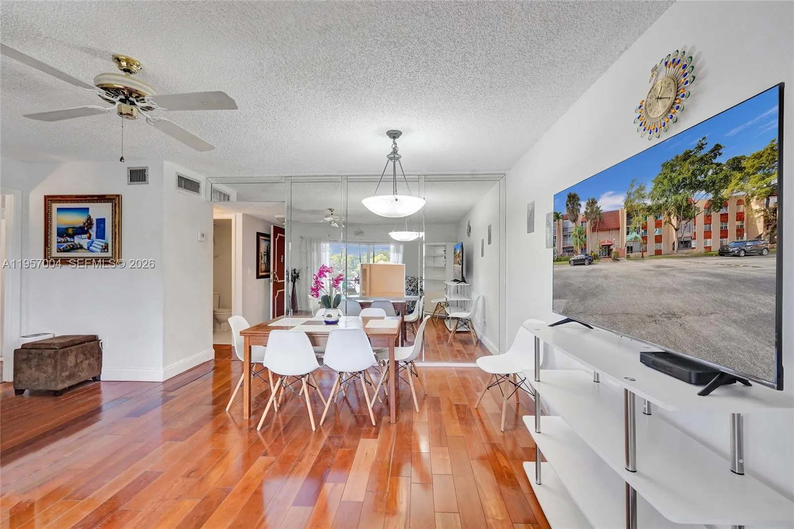 The living room is spacious and inviting, with ample natural light and a comfortable layout for relaxation and entertaining.