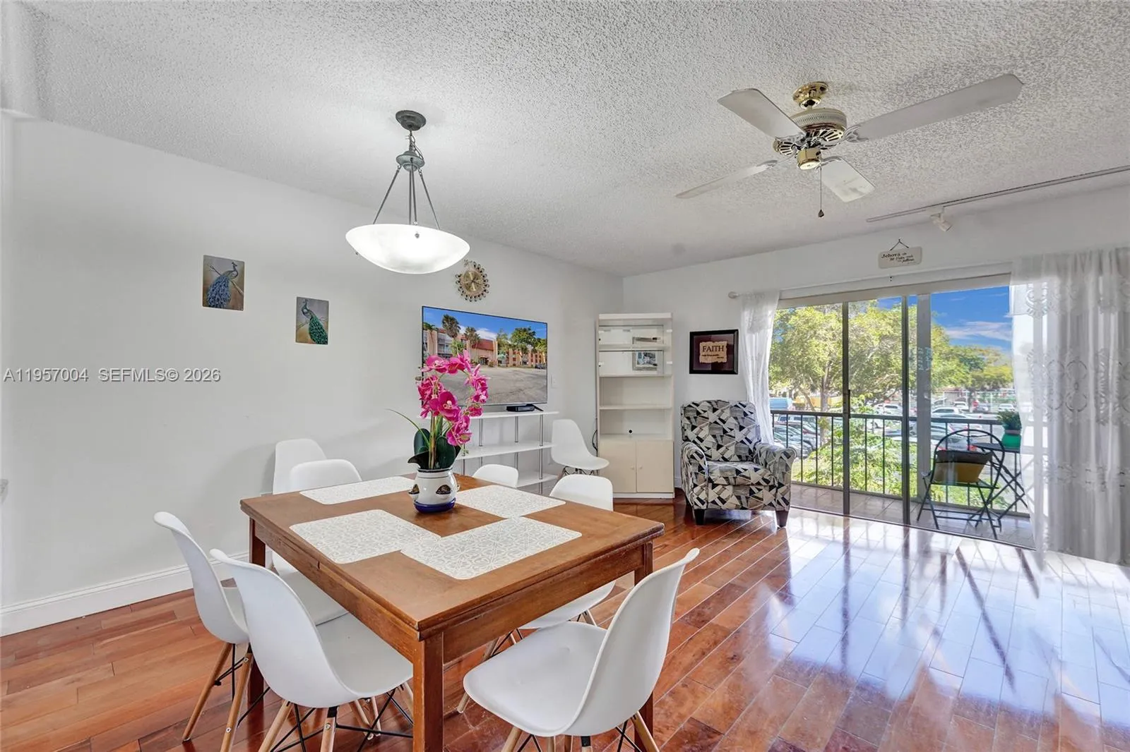 The living room is spacious and inviting, with ample natural light and a comfortable layout for relaxation and entertaining.