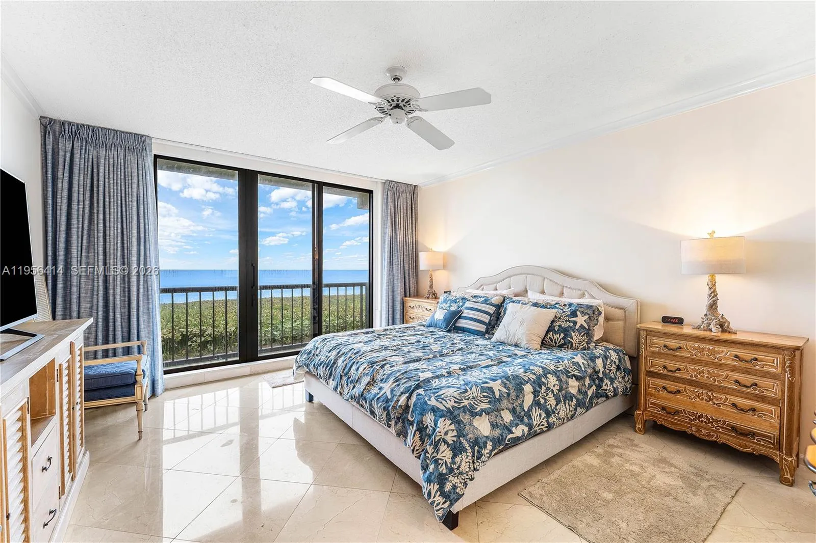 With balcony overlooking the ocean