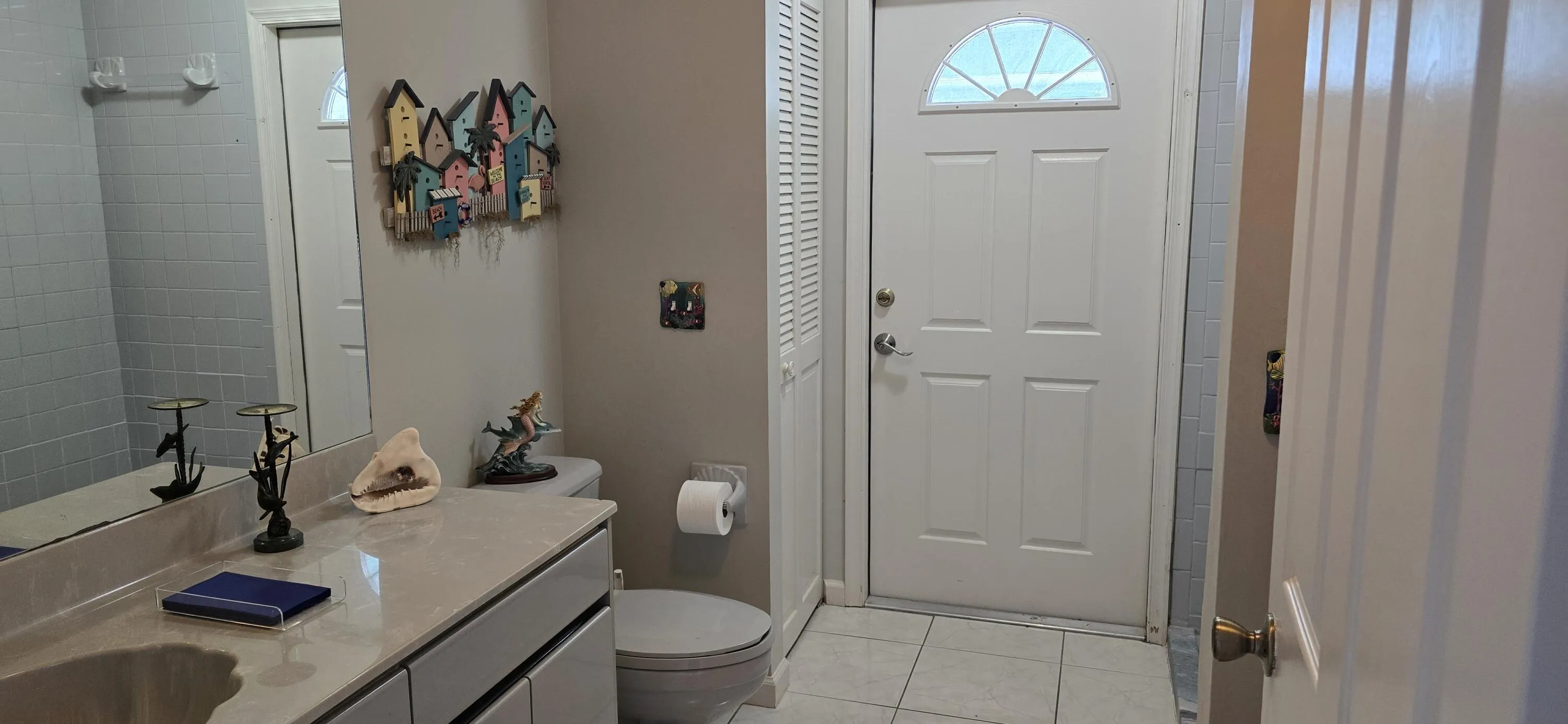 Pool bathroom into Lakefront Suite