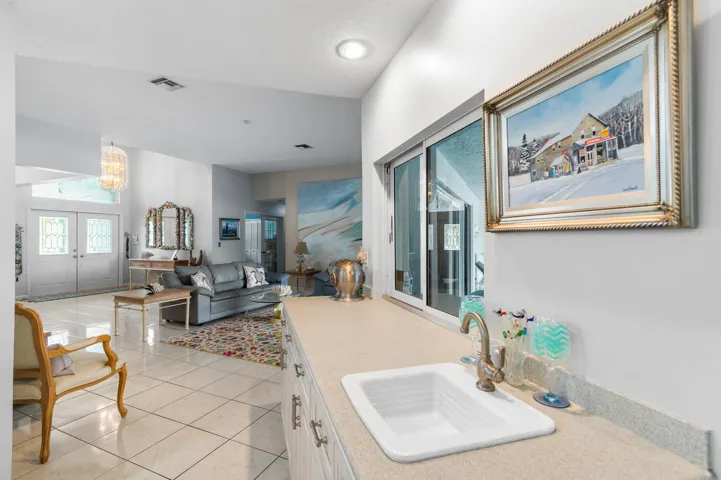 Wet bar and pass through window to patio.
