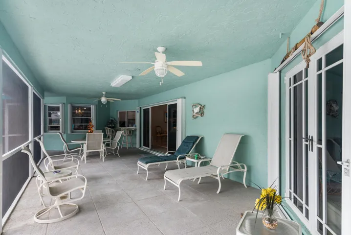 Wrap around screened patio.
