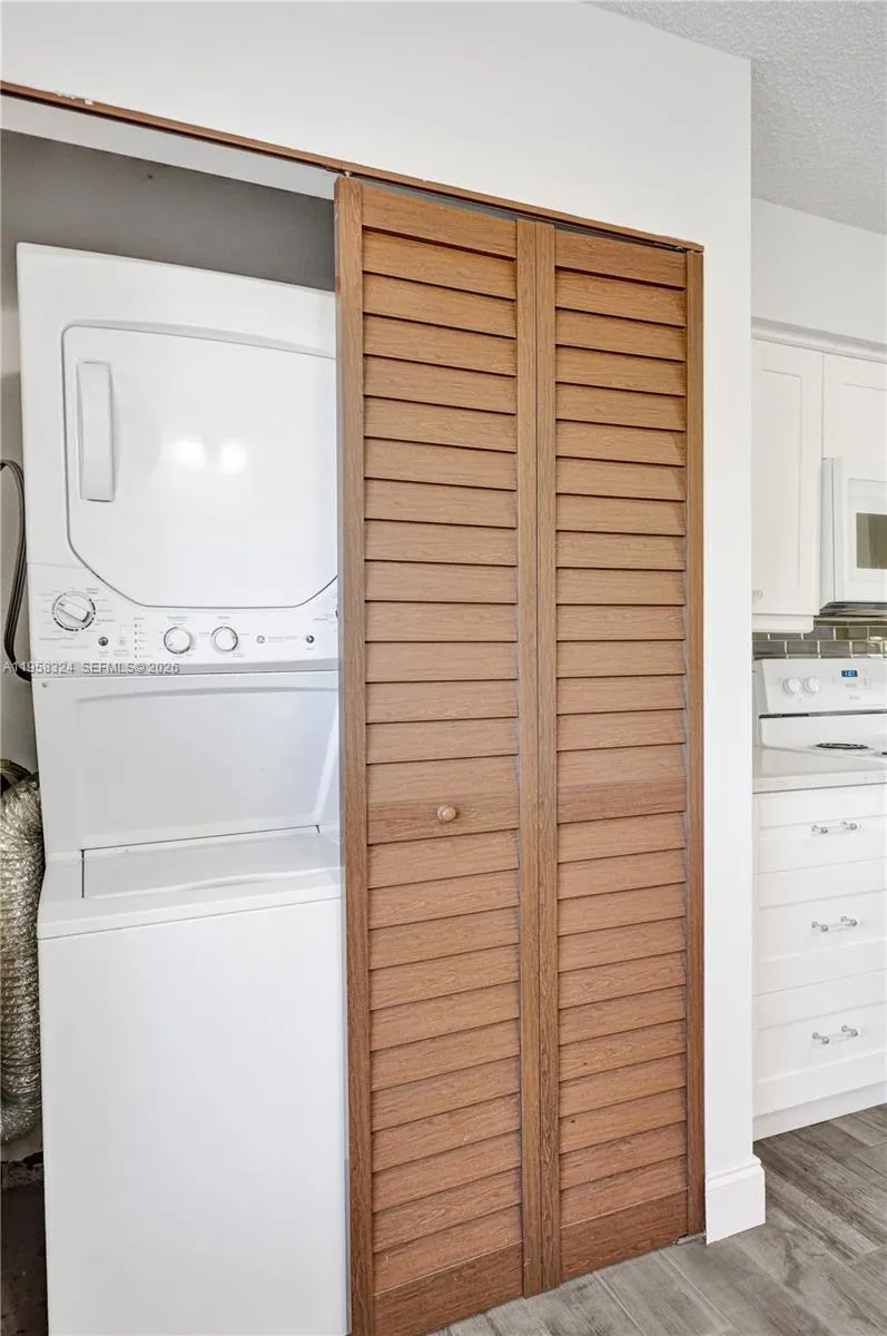 Washer and Dryer behind the Bi-Fold Doors