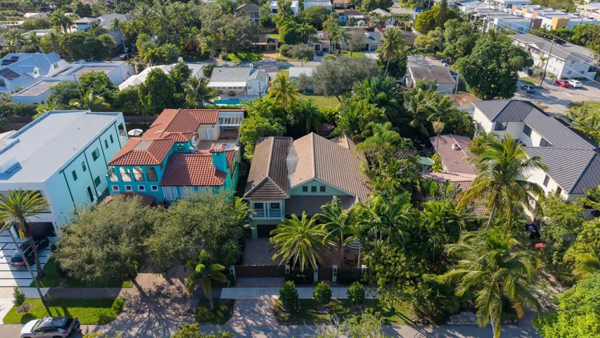 Nestled within a canopy of mature landscaping