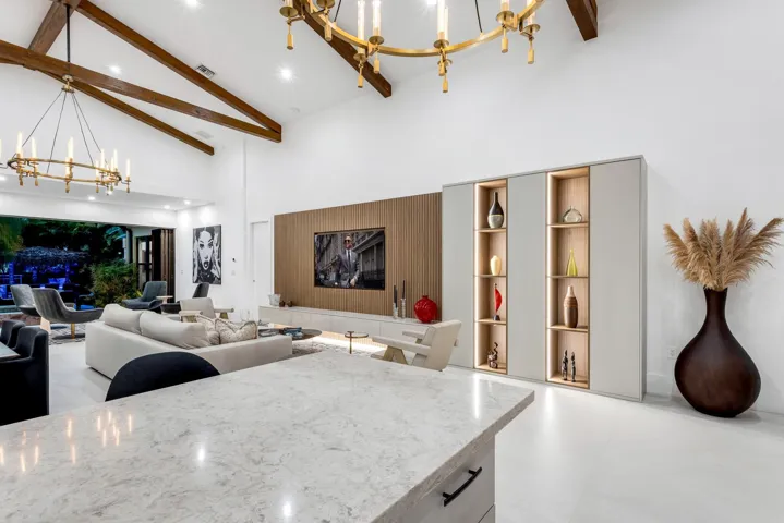 Open kitchen overlooking a showstopping living space.