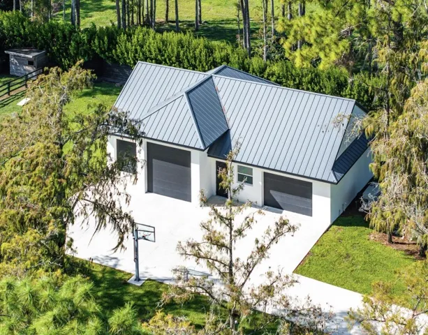 Secondary building with full bath, second set of laundry facilities, man cave, storage room & additional 30’+ deep parking.