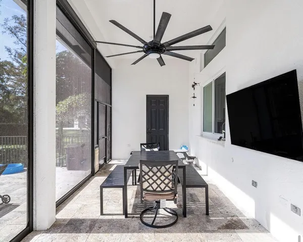 Summer kitchen, just below the bottom of the picture frame is a hibachi grill and BBQ pit. Automatic roll up screens. Zero mosquitoes out here today.