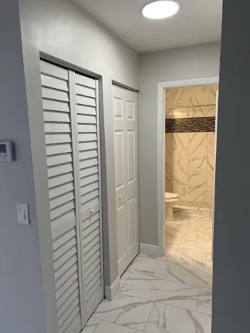 HALLWAY TO GUEST BDR & guest bth