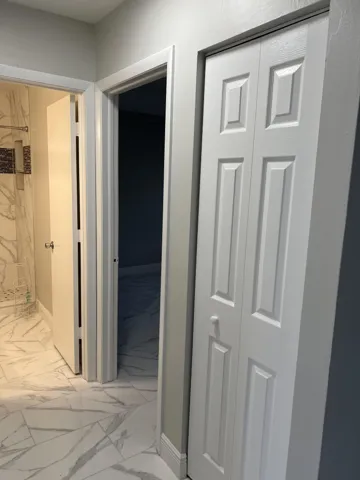 HALLWAY TO GUEST BDR & guest bth