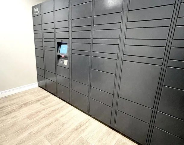 Amazon Locker. You get a text when your packages arrive.