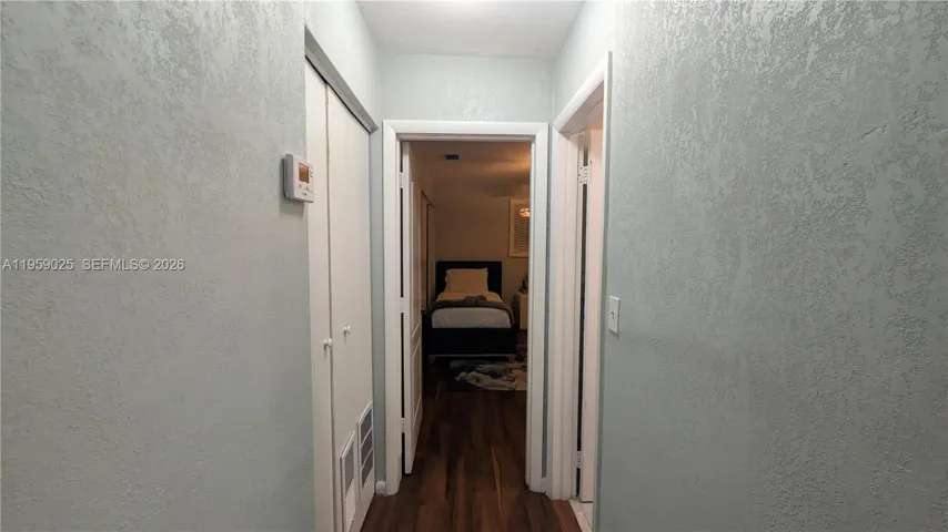View from hallway into the bedroom 2. Befre then we pass bath room 1