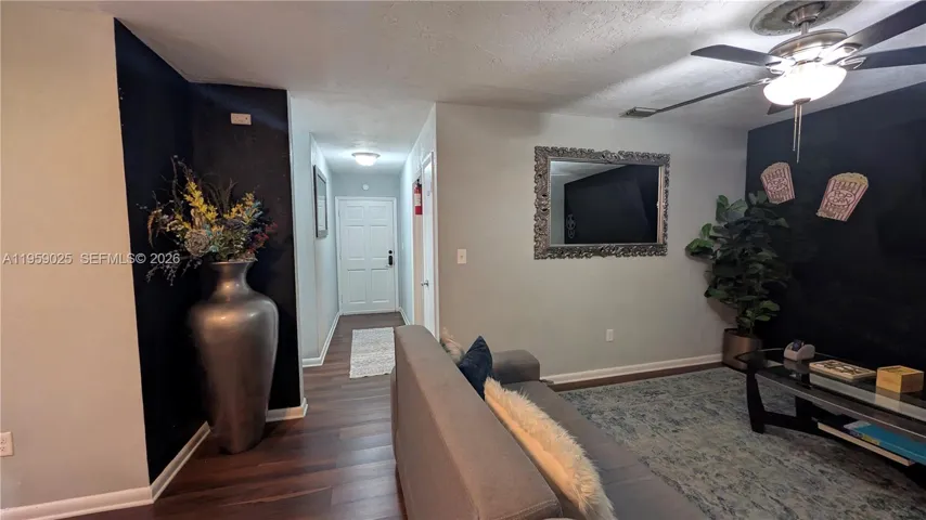 View from the living room , facing the front door entrance