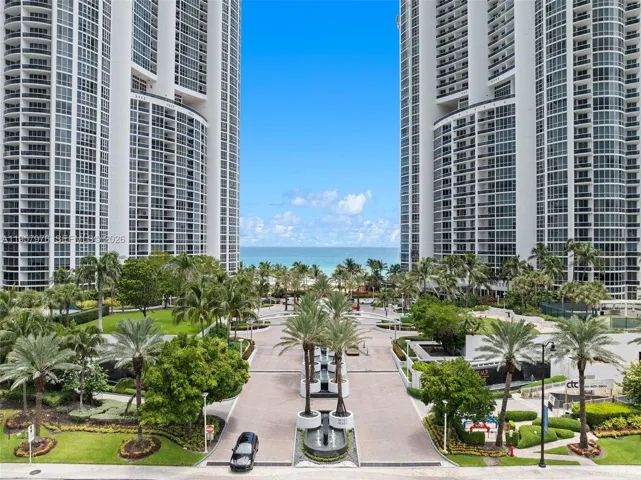 Iconic twin towers with direct private beach access