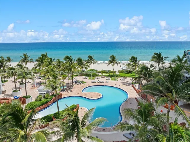 Resort-style swimming pool overlooking the Atlantic Ocean.