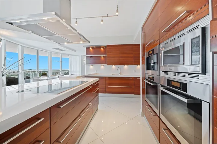 Spacious chef’s kitchen with generous counter space and seamless flow to living areas.