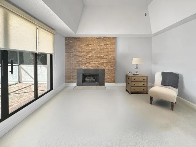 Fireplace behind bed. AI removed bed