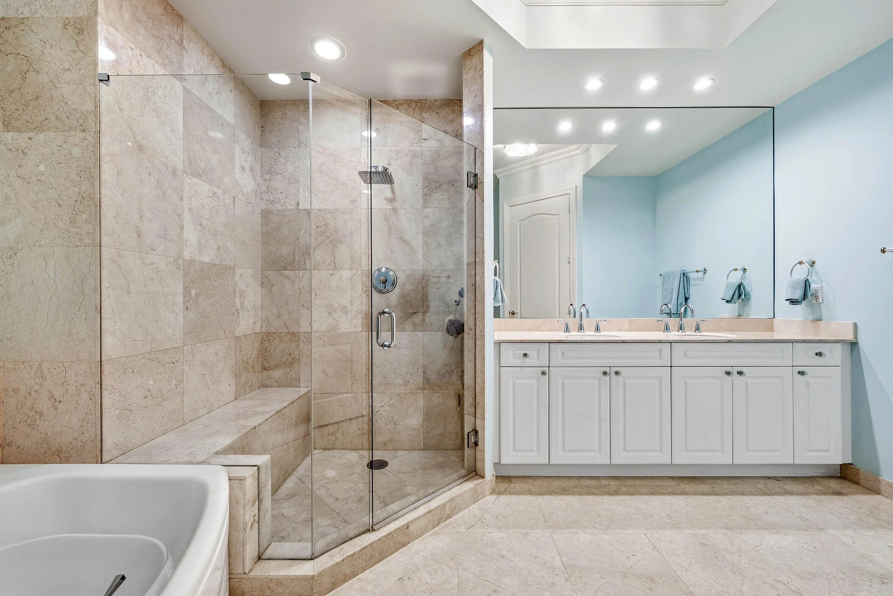 Marble flooring and shower with private water closet