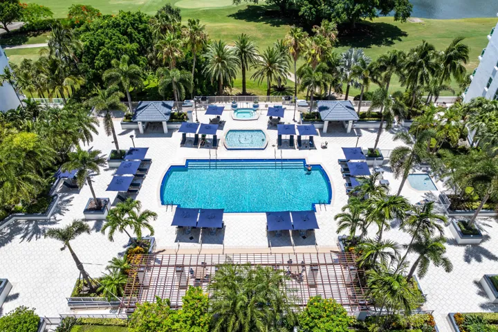 Resort style pool, spa, and sun deck with gorgeous golf course views
