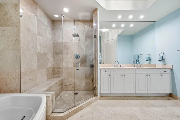 Marble flooring and shower with private water closet