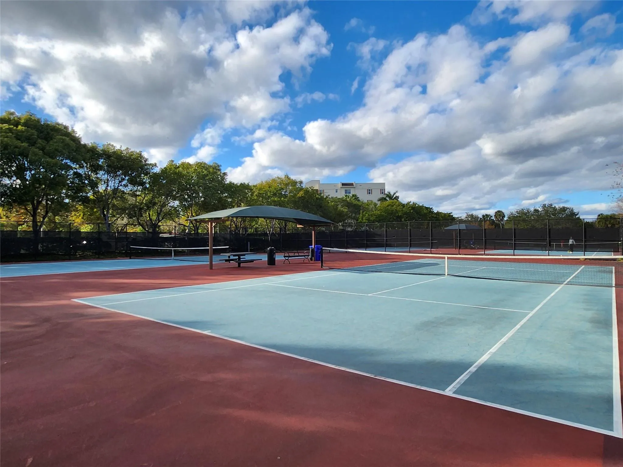 Offers 4 Tennis Courts!