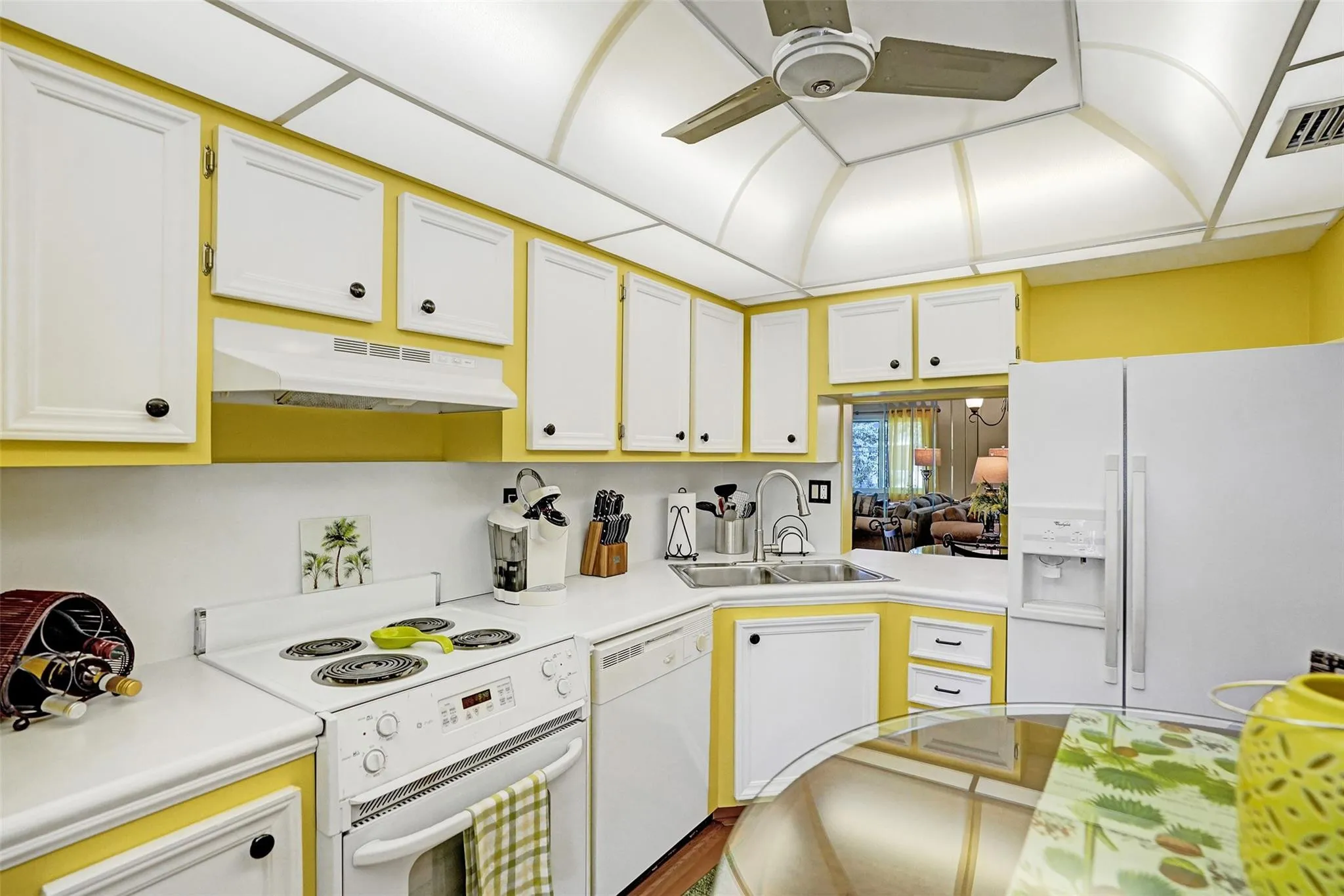 Bright & cheerful kitchen. Refrigerator and Dishwasher have been replaced with Stainless Steel adding a fresh modern touch to this kitchen.