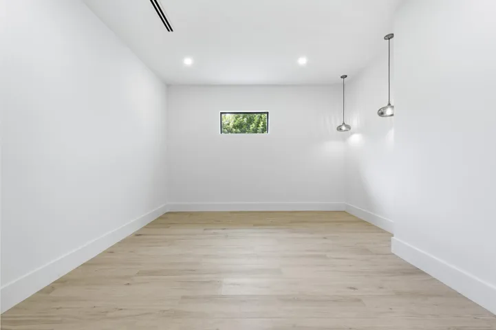 PRIMARY HERS WALK-IN CLOSET
