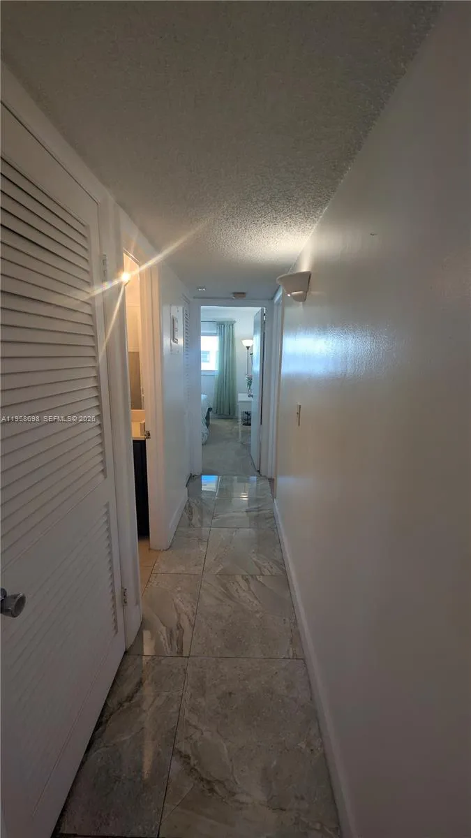 HALL WAY TO BEDROOM AND BATHROOM