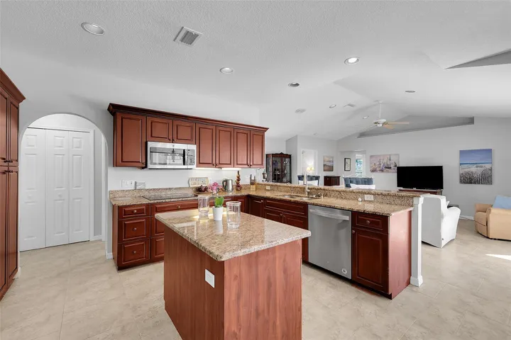 2nd refrigerator in laundry room, double ovens,high speed kettle, pantry and volume ceiling