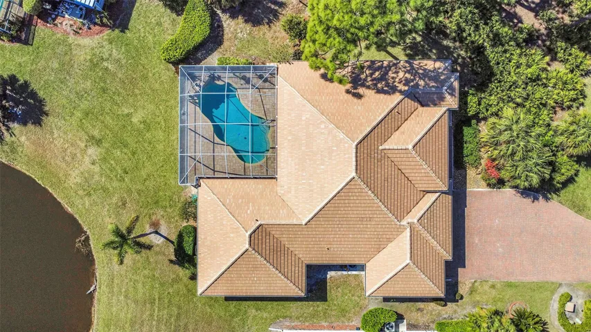 New roof with flat tile in contemporary neutral color, secured with polyfoam.