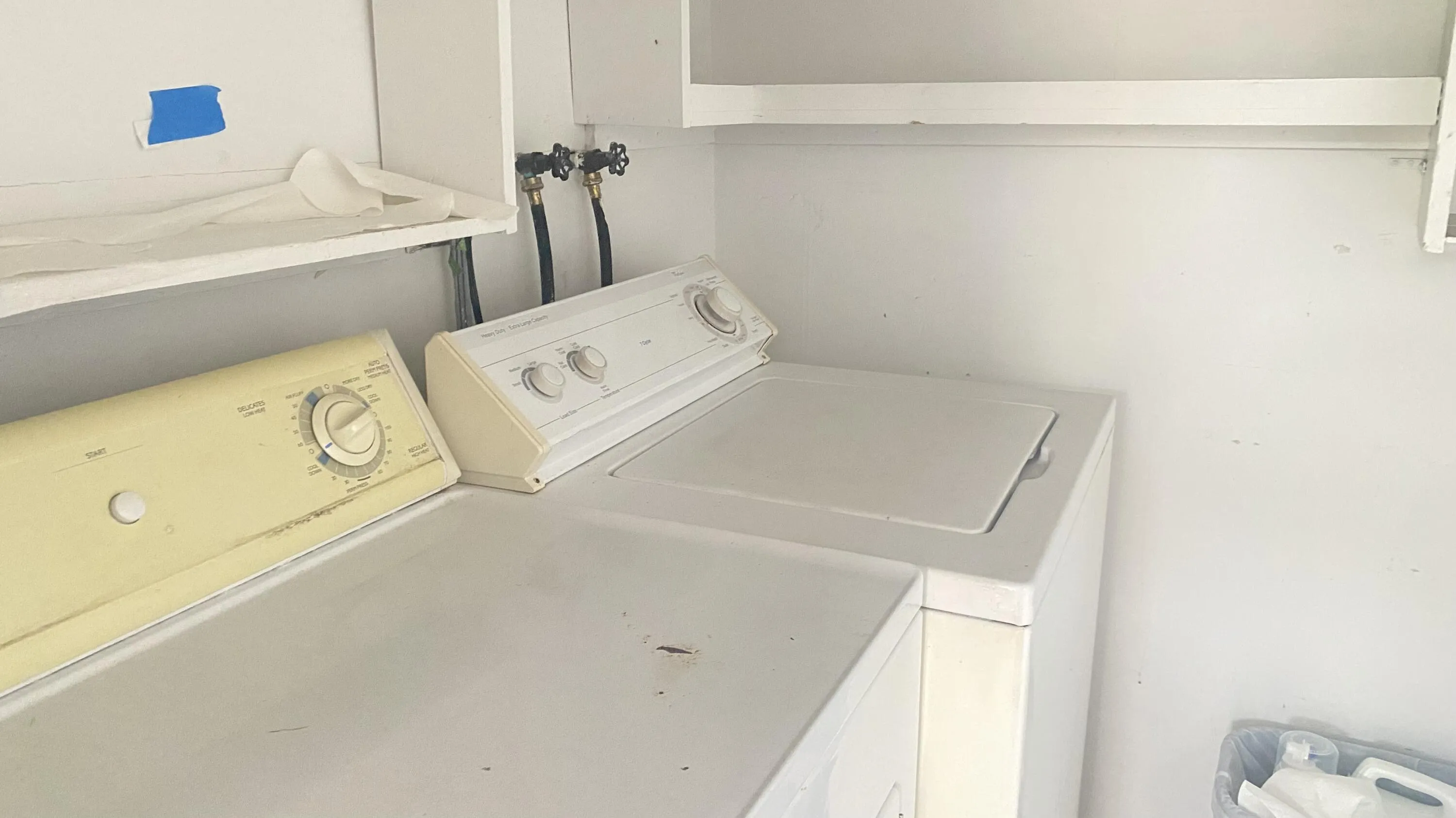 enclosed laundry room on balcony
