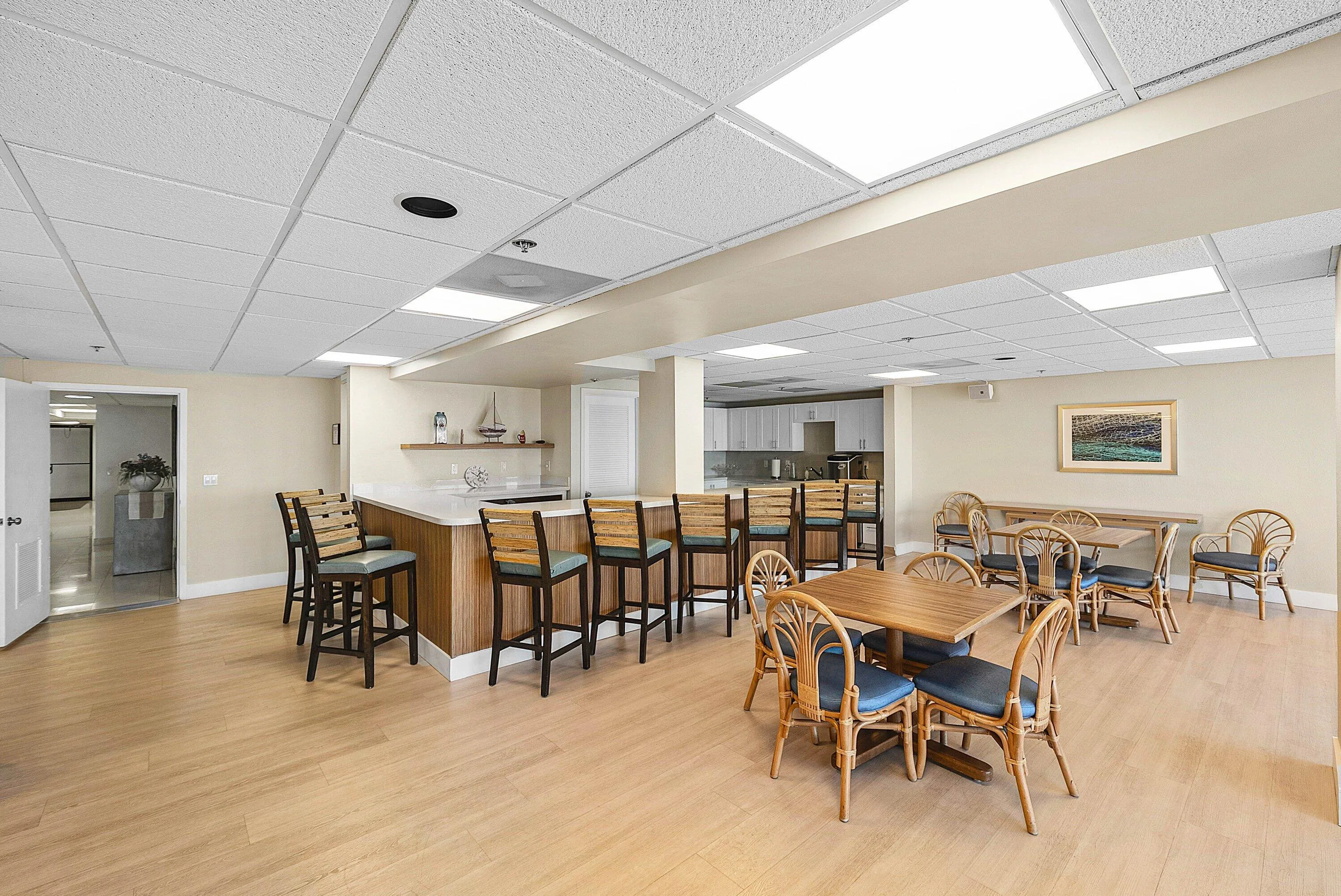 BUILDING CLUBHOUSE WITH OPEN KITCHEN AND BAR AREA