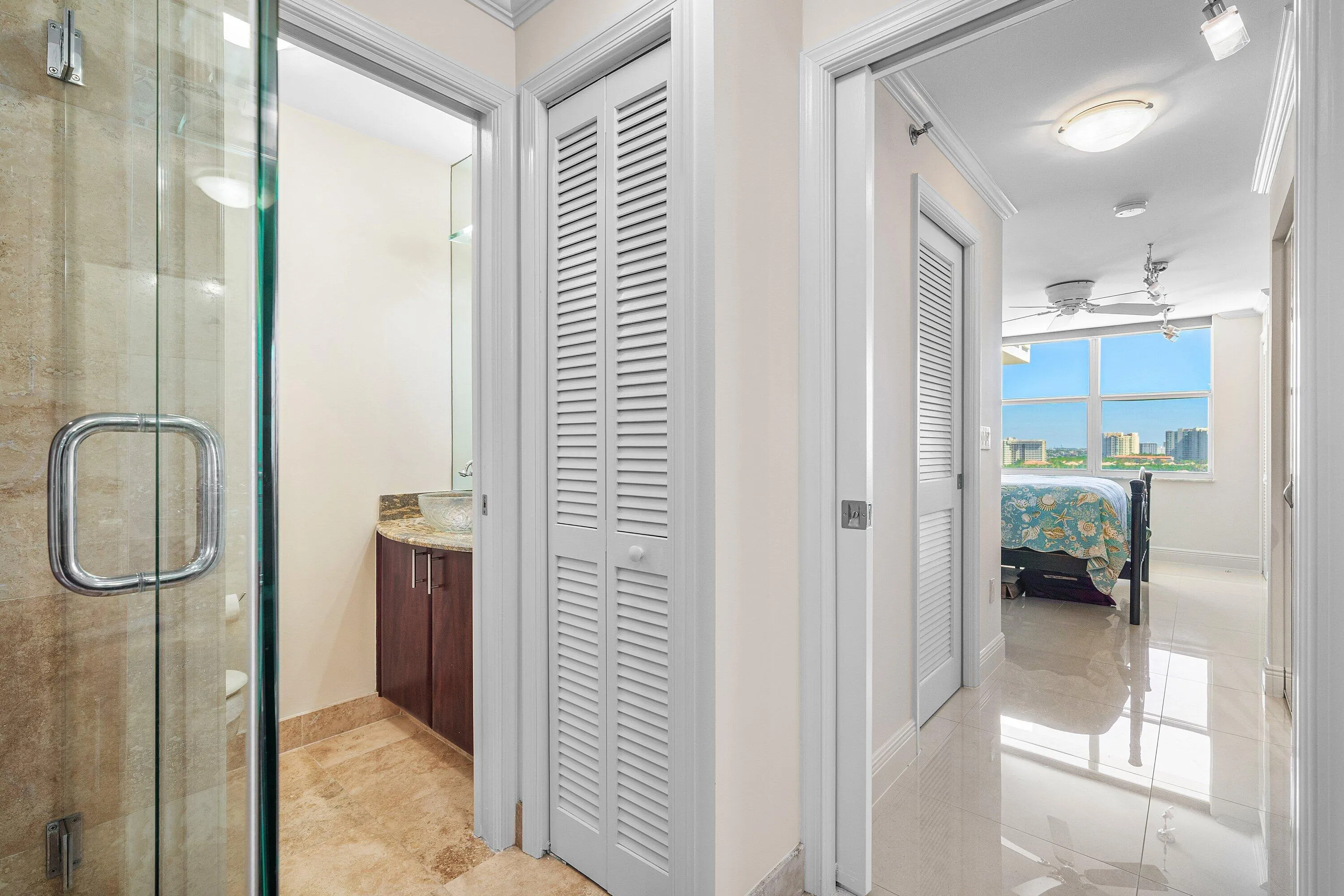 Separate toilet room with sink in the main bathroom with linen closet