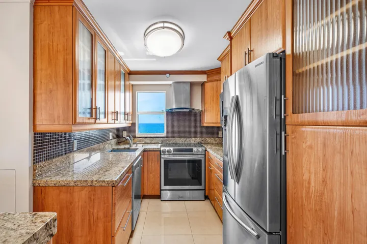 Custom Kitchen with Stainless Steel appliances