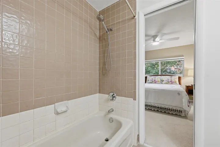 Well appointed Jack and Jill bathroom offers both style and convenience for everyday living.