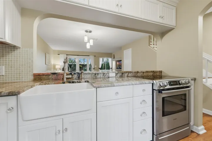 Bright kitchen featuring stainless steel appliances and a functional layout designed for everyday living.