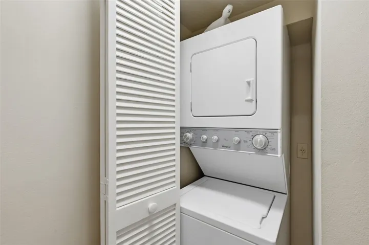 Stackable full size washer and dryer provide everyday convenience while maximizing valuable living space.