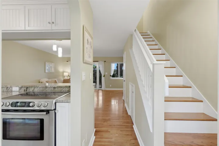 The staircase leads to two spacious bedrooms connected by a thoughtfully designed Jack and Jill bathroom