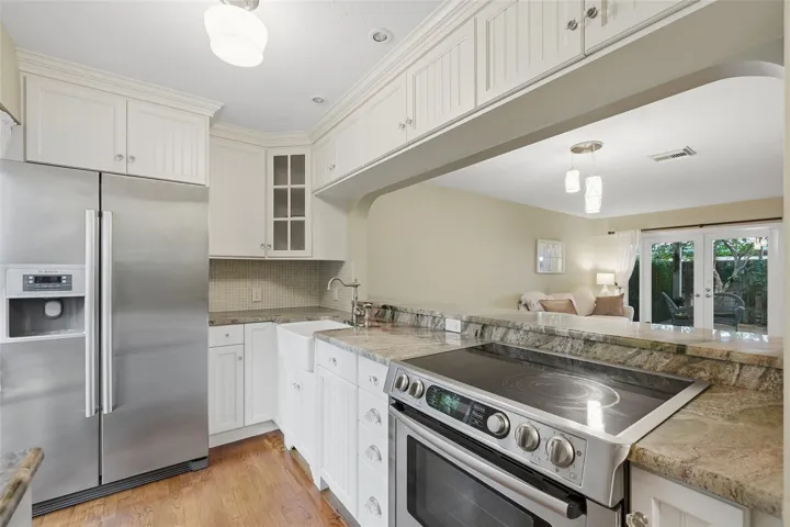 Thoughtfully designed kitchen offers generous workspace and a seamless flow for everyday living.