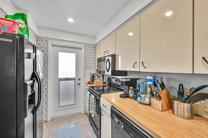 kitchen with impact door and window