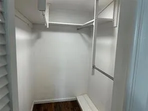 Spacious walk in master bedroom Closet