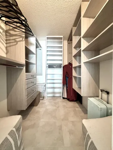 CUSTOM PRIMARY CLOSET